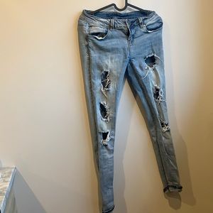 Blue ripped jeans by revamped